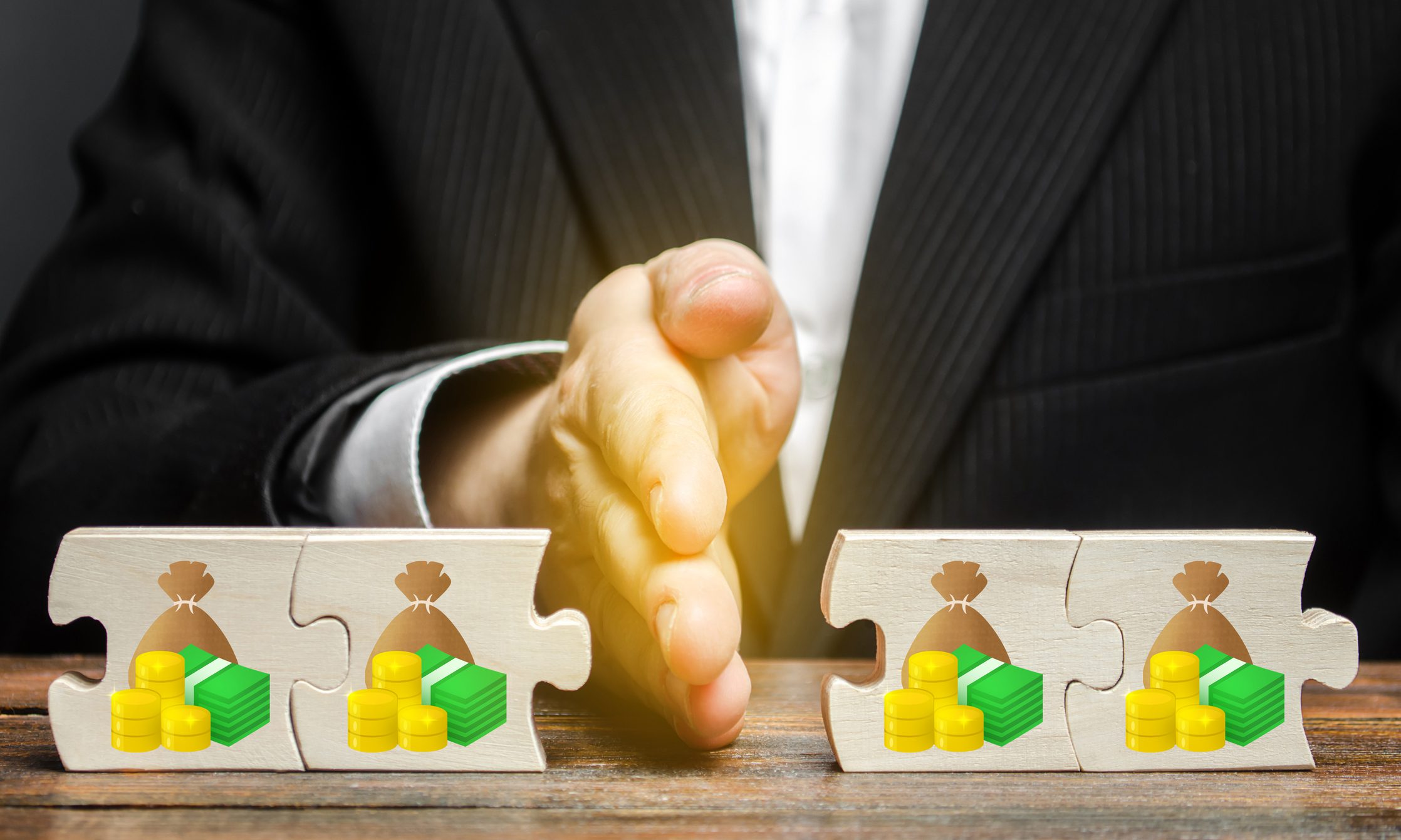 The palm of the hand divides the puzzles into money in half. Financial management and distribution of funds. Saving and investing. Property and business division. Divorce and legal services